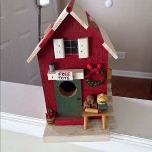 Red and White Birdhouse with Holiday Decor